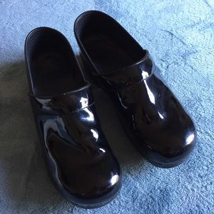 Dansko black patent leather clogs